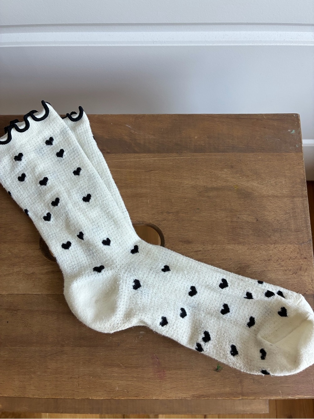 Women’s Cream Crew Socks with Black Heart Pattern